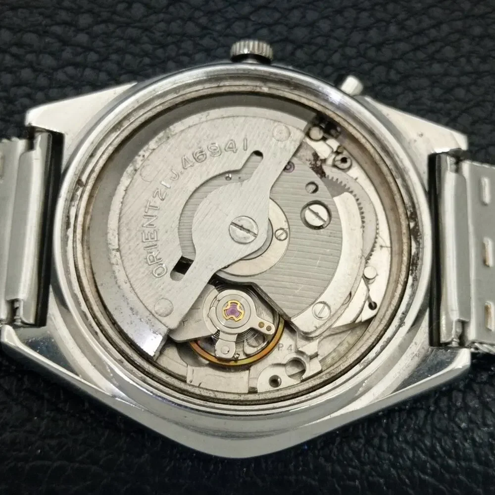 Vintage 1990 Orient Automatic Mens Silver Watch W/daydate & Green accents